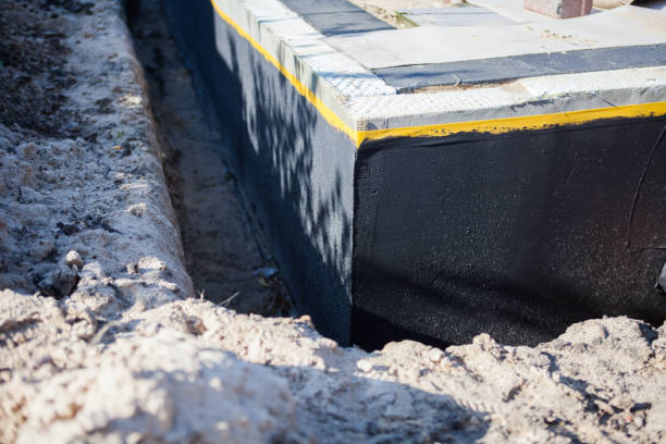 Professional Interior Drainage System technician working in Coats, KS